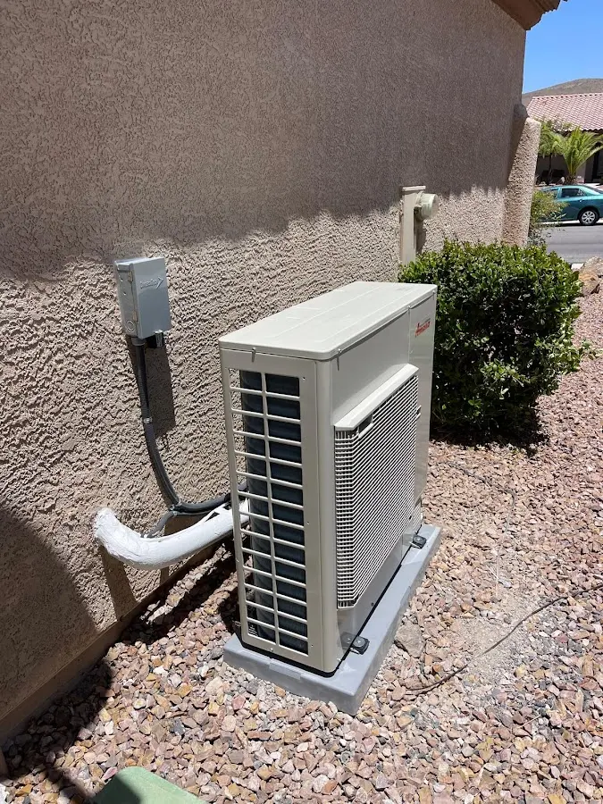Residential air conditioning condenser unit in Tolleson